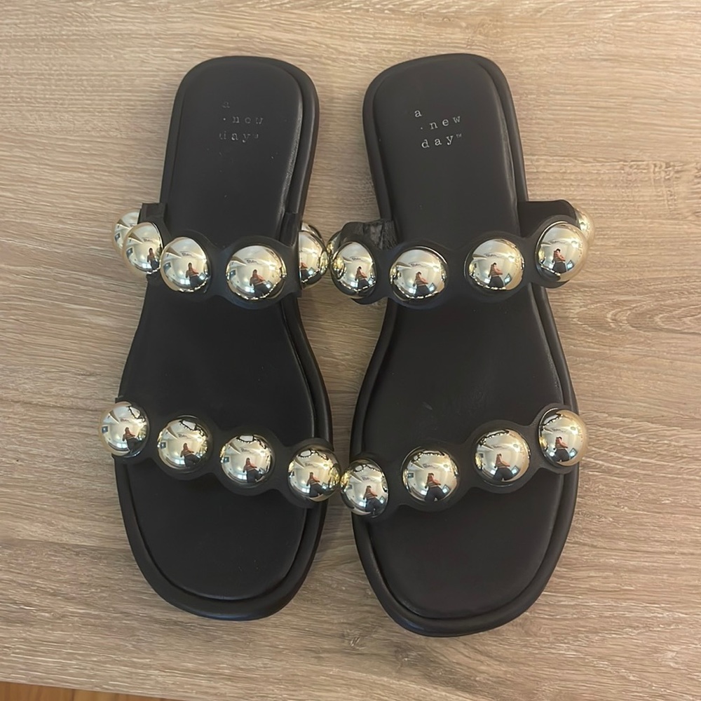Black studded flat sandal